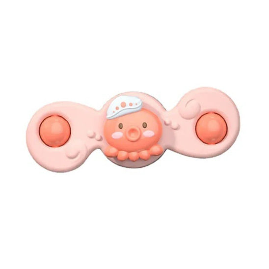 Le Ventouse Spinner - Jouet de Bain Bébé est un jouet de bain rose avec deux boutons ronds, représentant une jolie pieuvre avec un chapeau blanc au centre - parfait pour rendre l'heure du bain amusante et captivante pour les bébés.